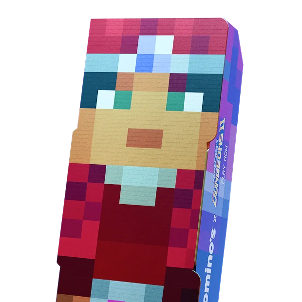The Valorie collectible Domino's box: the hero's pixel-art face wrapped around a pizza box.